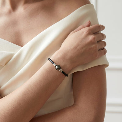 Black Tahitian Round Pearl on Rubber Poe Rava Bracelet
